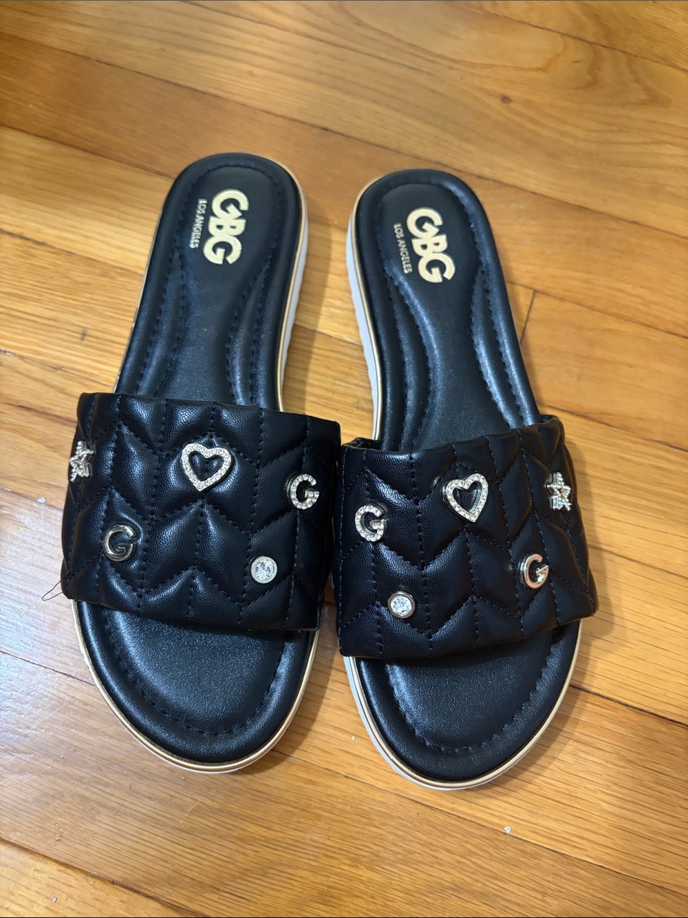 GBG Los Angeles Black Quilted Slide Sandals with Gold Accents